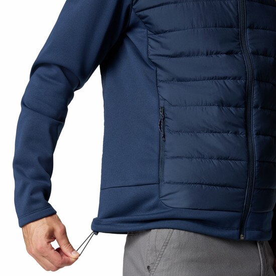 Close up the navy Columbia WVU full zip jacket showing the drawcord adjustable hem.