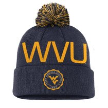 Navy Nike WVU winter beanie with navy and gold pom pom, knit-in WVU on hat, and faux seal embroidery featuring the Flying WV Logo on front cuff